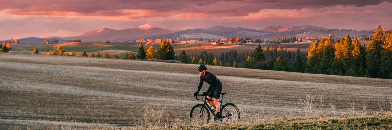 Image of a man riding a gravel bike 