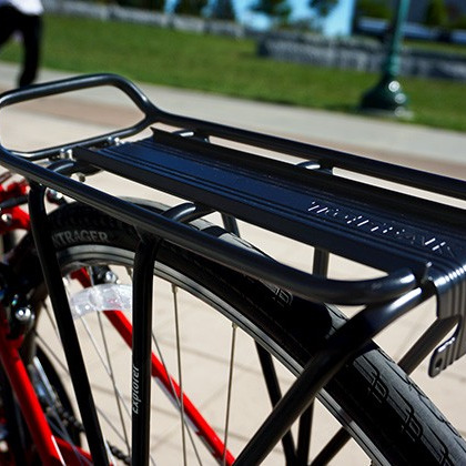 A close-up of a rack on the back of a bike