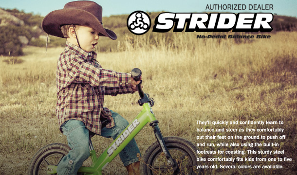 child riding a strider bike