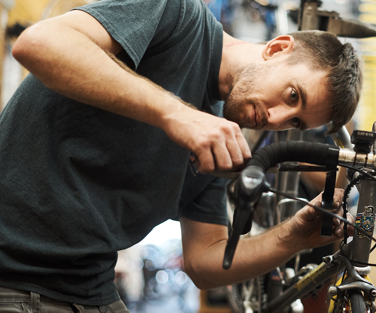 Bike Technician working on a bike