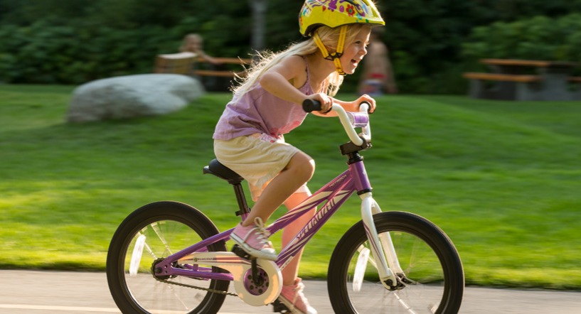 Girl on 16-inch kids' bike
