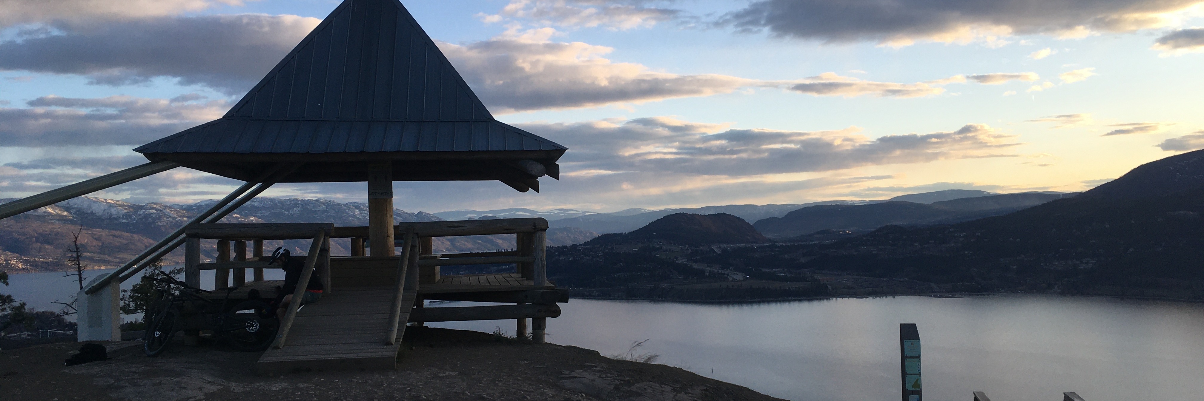 View of the Pagoda and lake in the backdrop from the top of Shale Trail Mountain Bike Trail at Knox Mountain Park, Kelowna