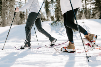 a couple of hikers in snowshoes