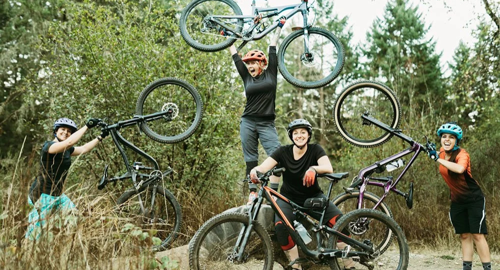 Women mountain bikers.