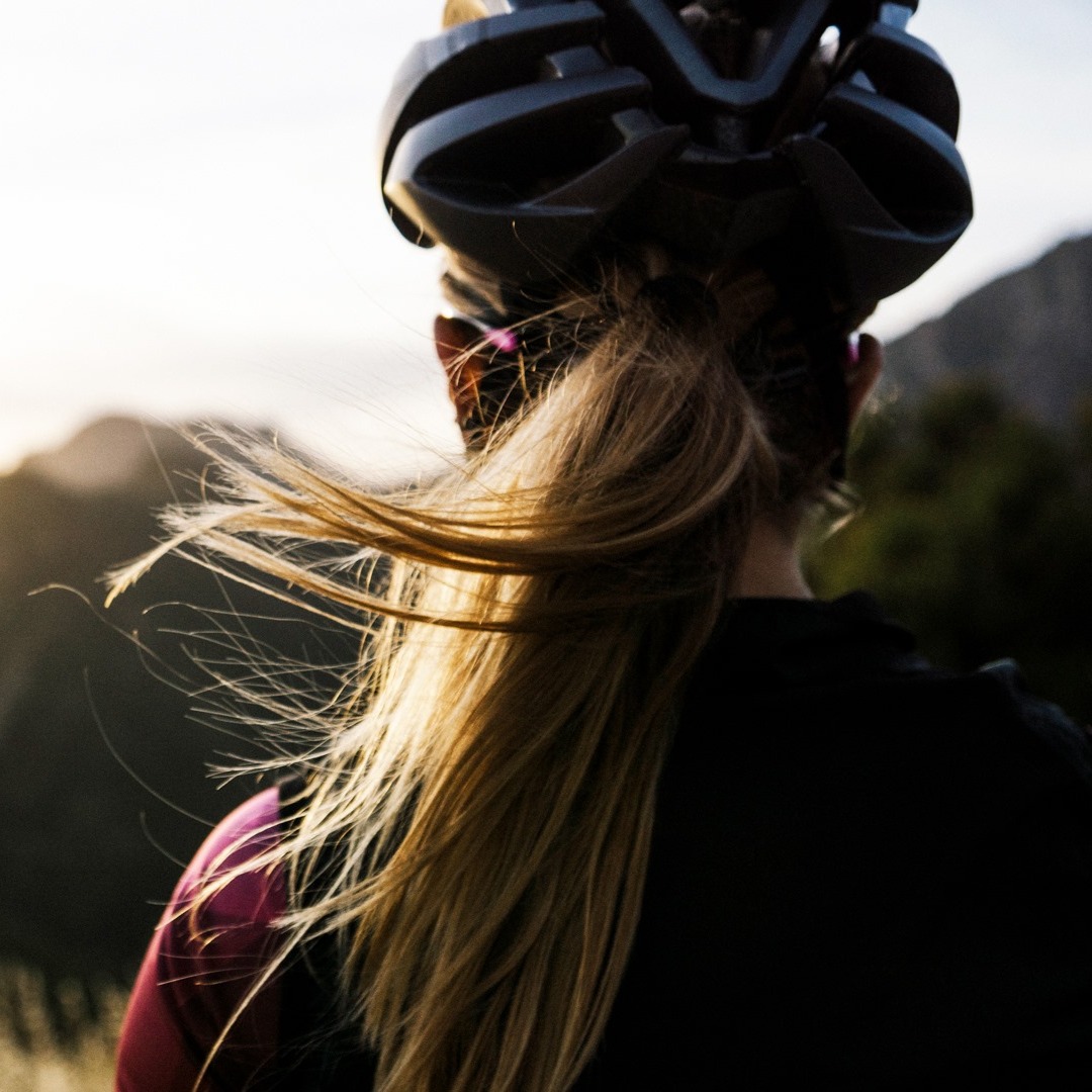 Woman with ponytail wearing a Bontrager helmet