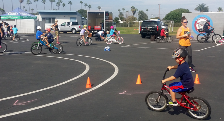 Kids Learning to ride their bikes safely