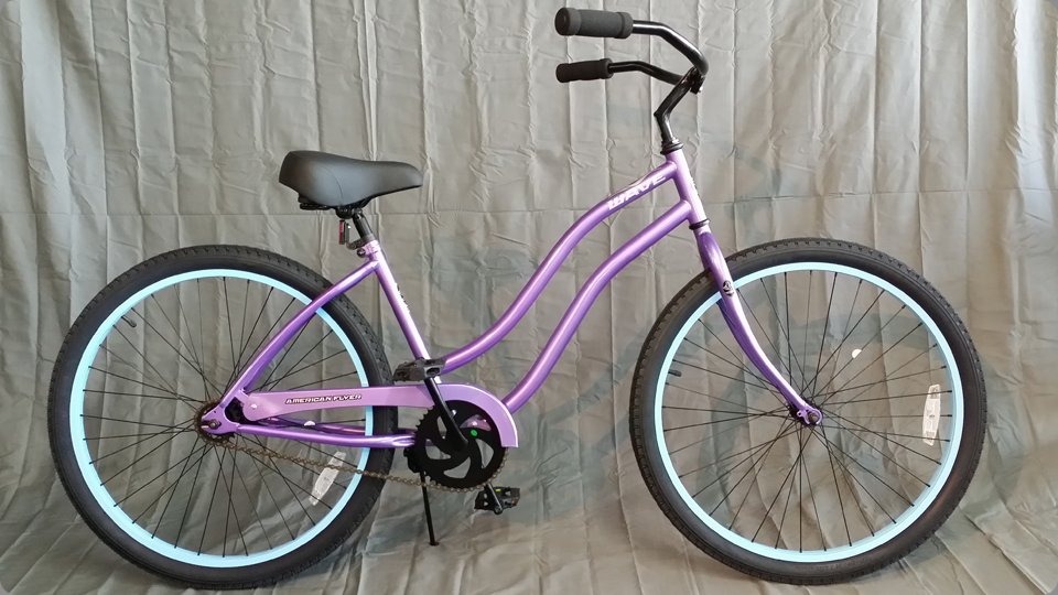 purple cruiser bike with blue rims