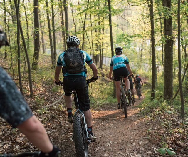 Mountain bike group riding local trails
