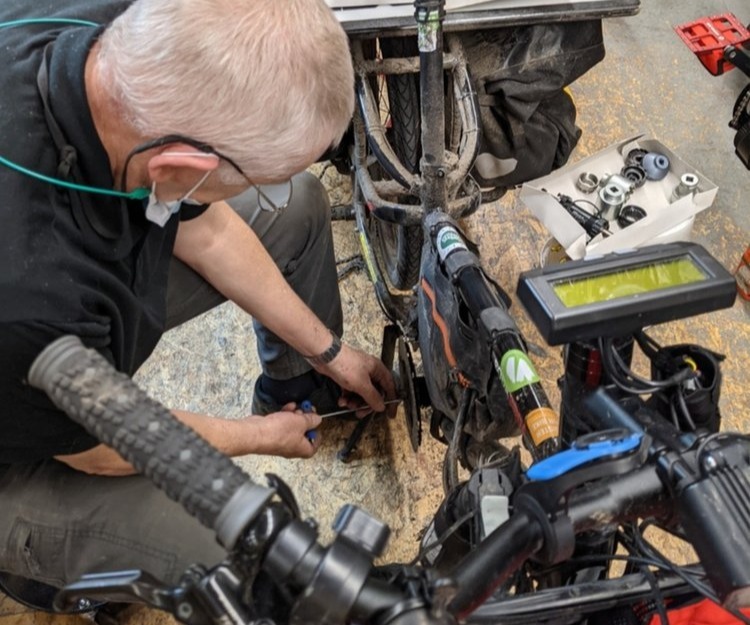 A bike being serviced by a technician