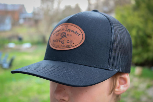The Crank & Sprocket Bicycle Co. Leather Patch Trucker Hat