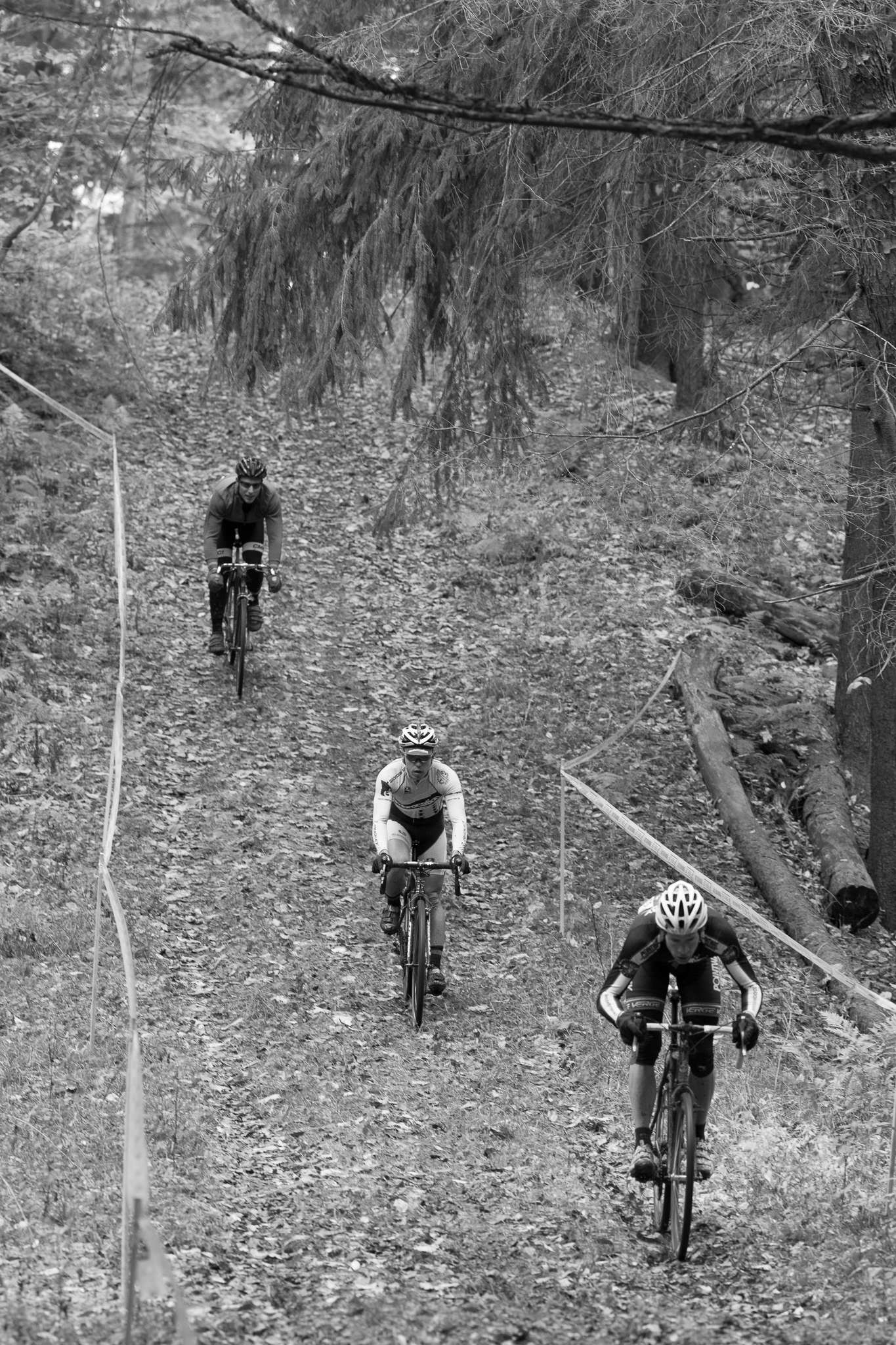 Black & white cyclocross race climb