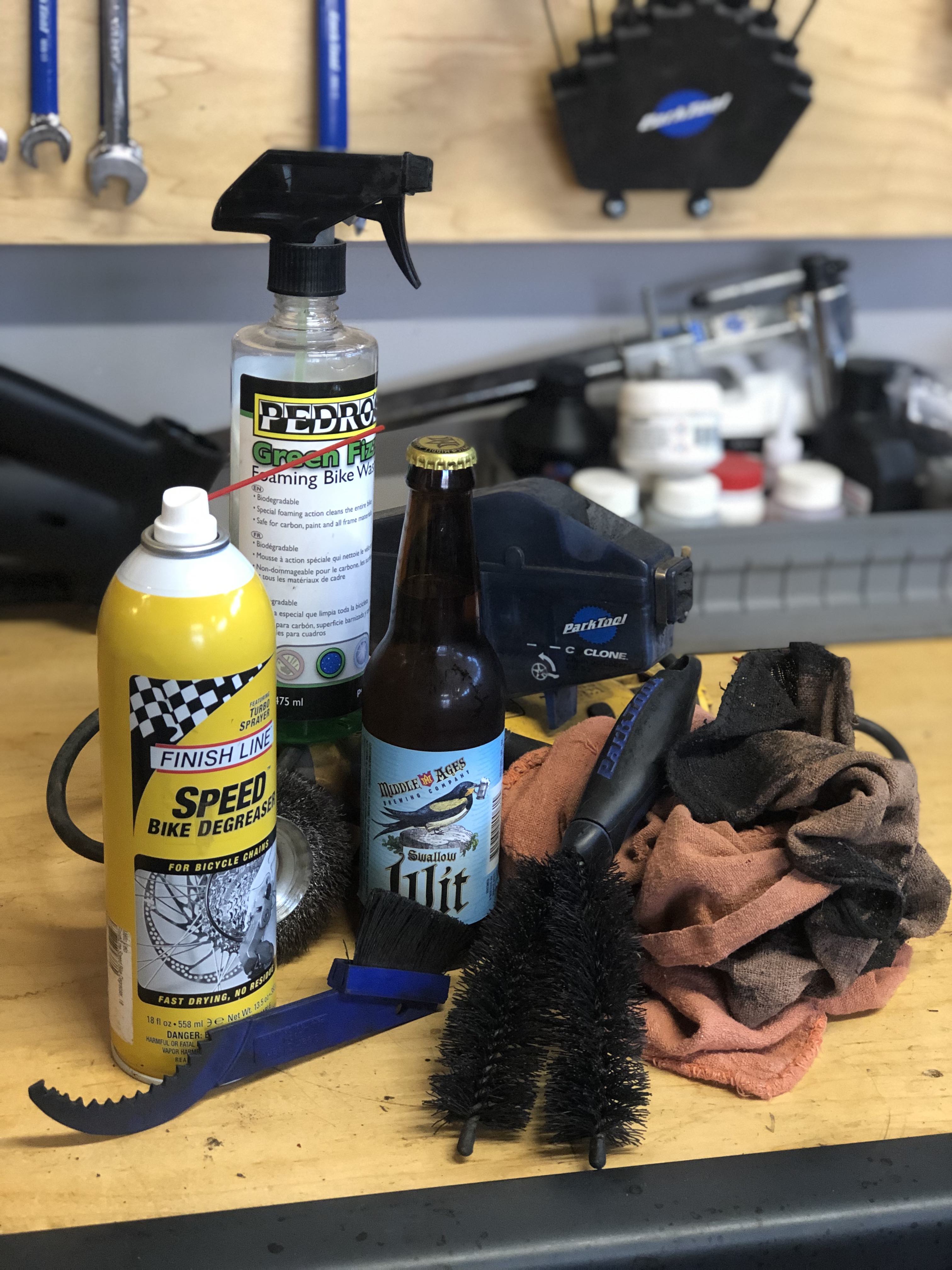 Bike cleaning tools and a beer
