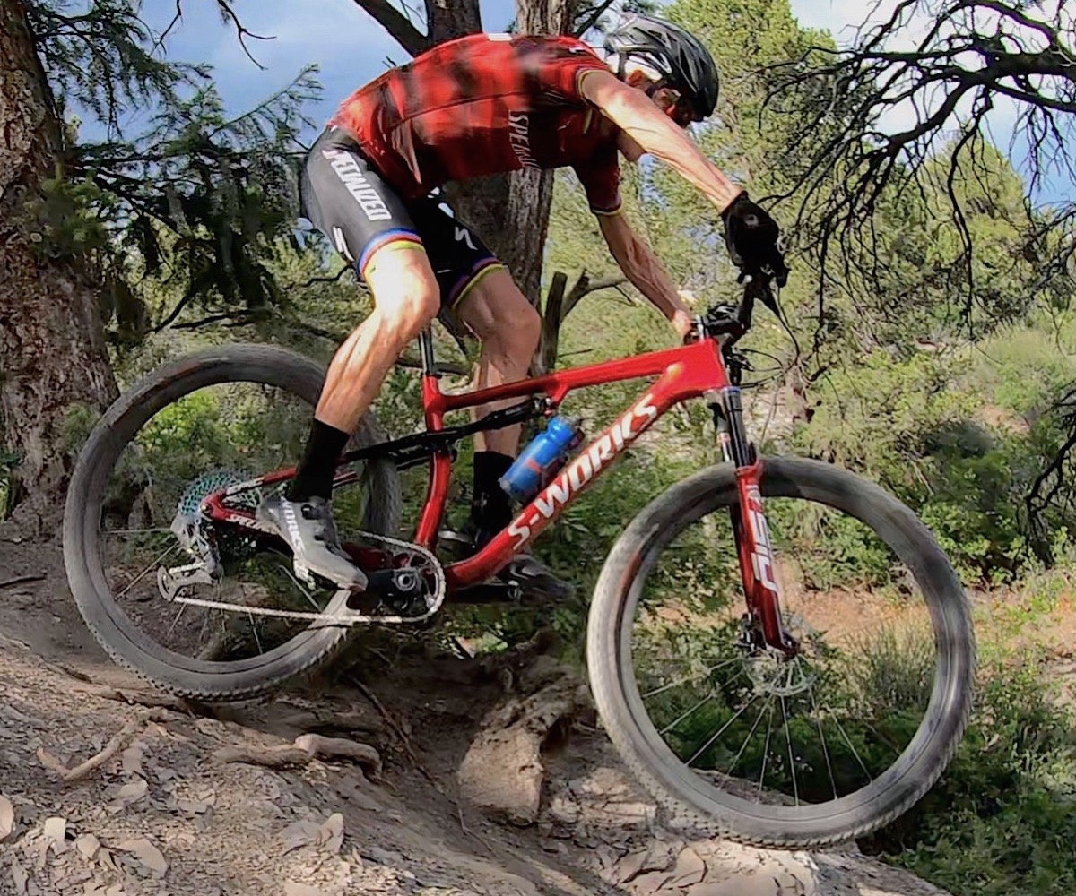 Mountain biker riding a Specialized S-works