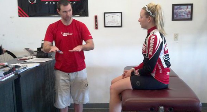 Bike Fitter and cyclist talking about her fitting session