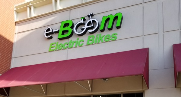 exterior of eBoom bike shop at the strip mall