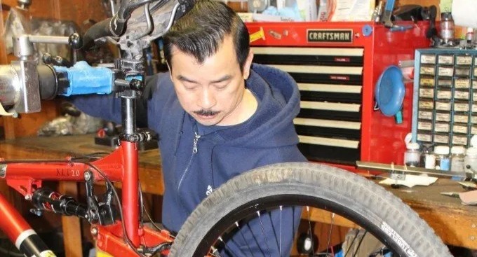 Bike Technician working on a bike