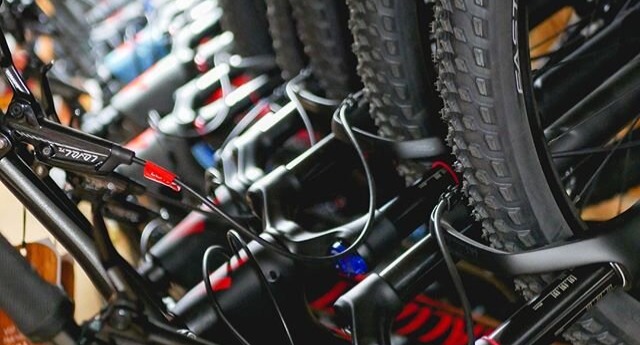 closeup of a row of mountain bikes