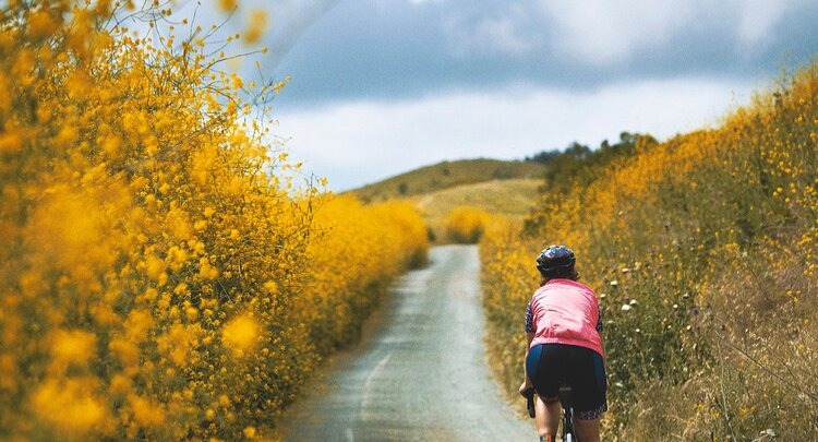 Woman riding a road bike