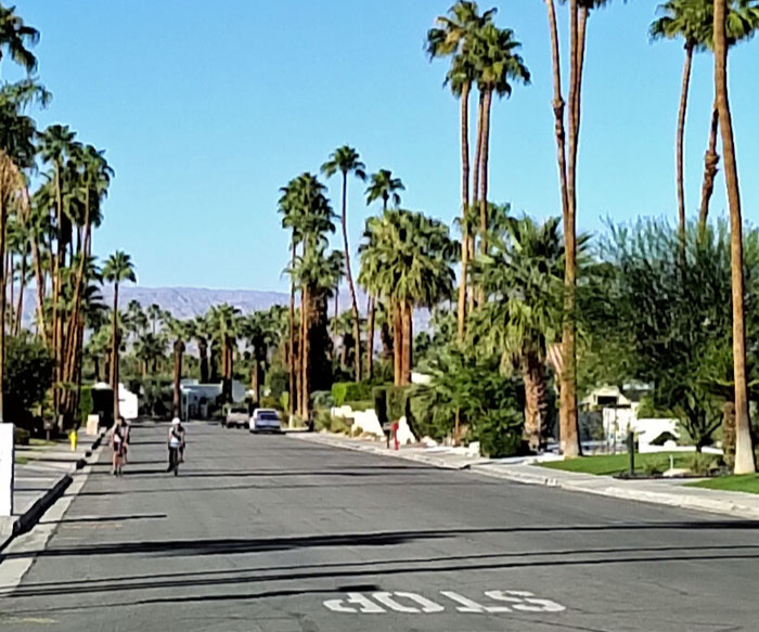residential street with riders in palm springs