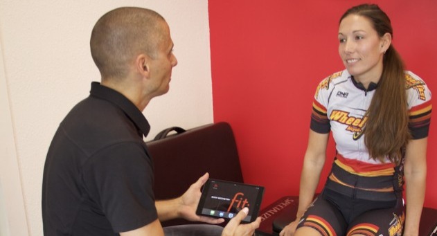 Bicycle Fitter interviewing a rider for a fit
