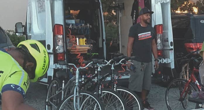 Kris standing outside the mobile service van