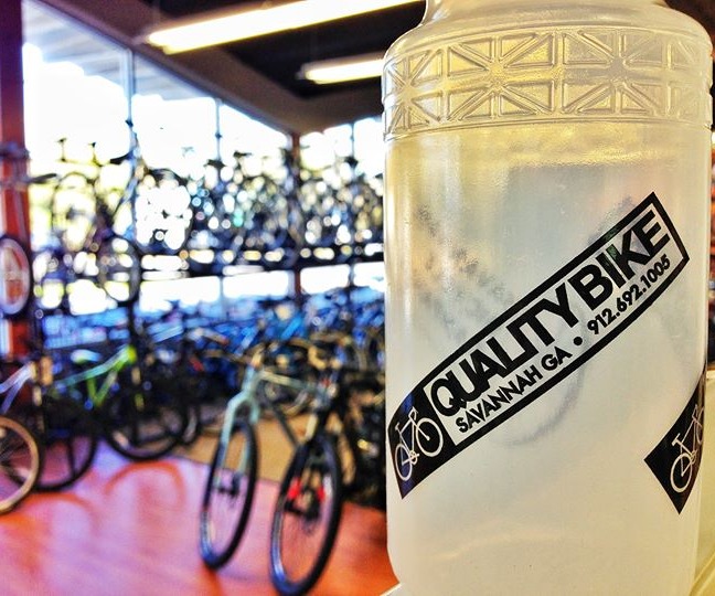 close up of a Quality Bike Shop water bottle