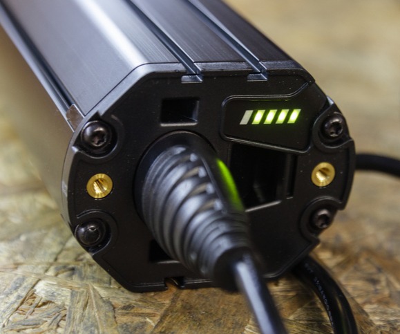Close up charging an e-bike battery