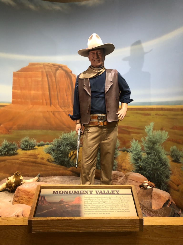 Figure of John Wayne inside museum
