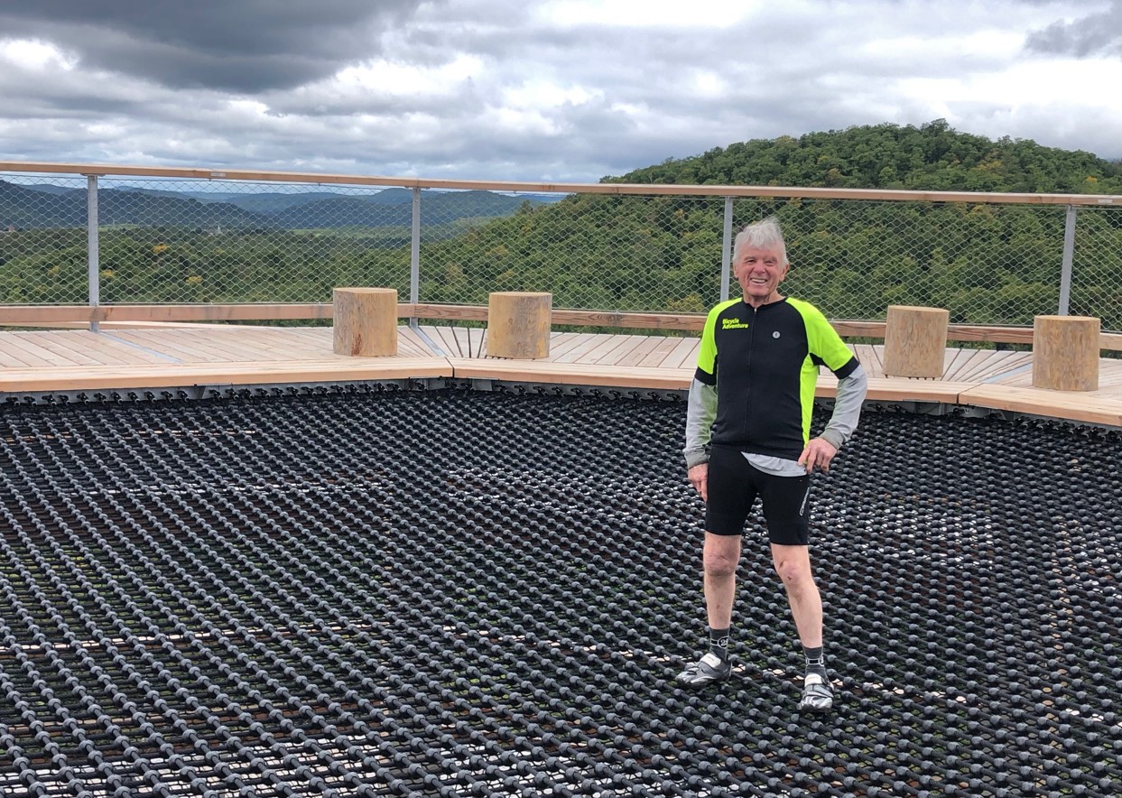 Richard standing on net at top of the tower