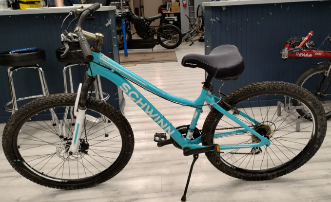 Light blue bike with front suspension