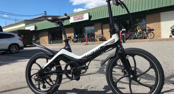 folding ebike in front of the bike store