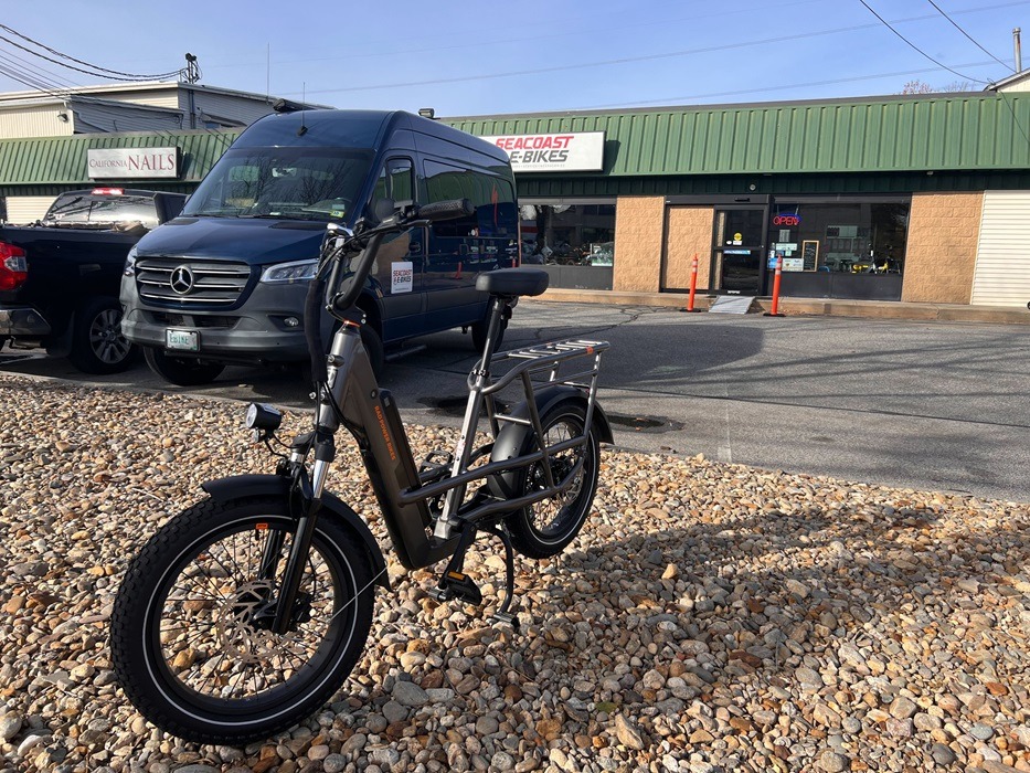 mid tail cargo ebike on display outside a store