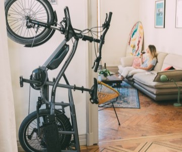 E-bike stored vertically in an apartment