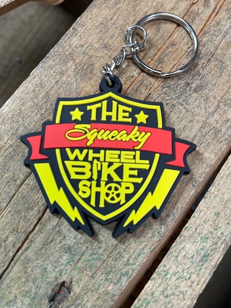 The Squeaky Wheel Bike Shop Key Chain 