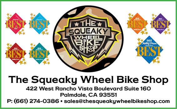 The Squeaky Wheel Bike Shop graphic logo