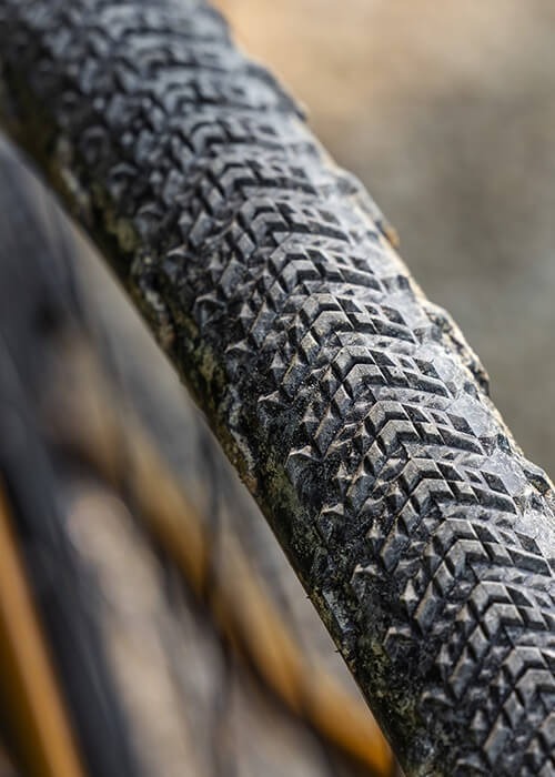 A closeup detail view of a Teravail tire's rubber tread design.