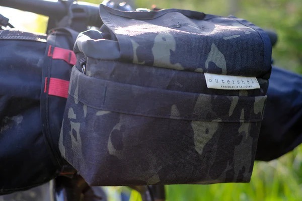 Closeup view of one of the bike's bags loaded with gear