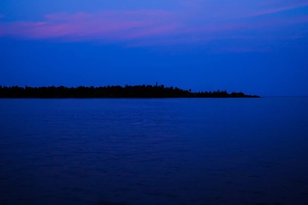 View of the lake after dusk. 