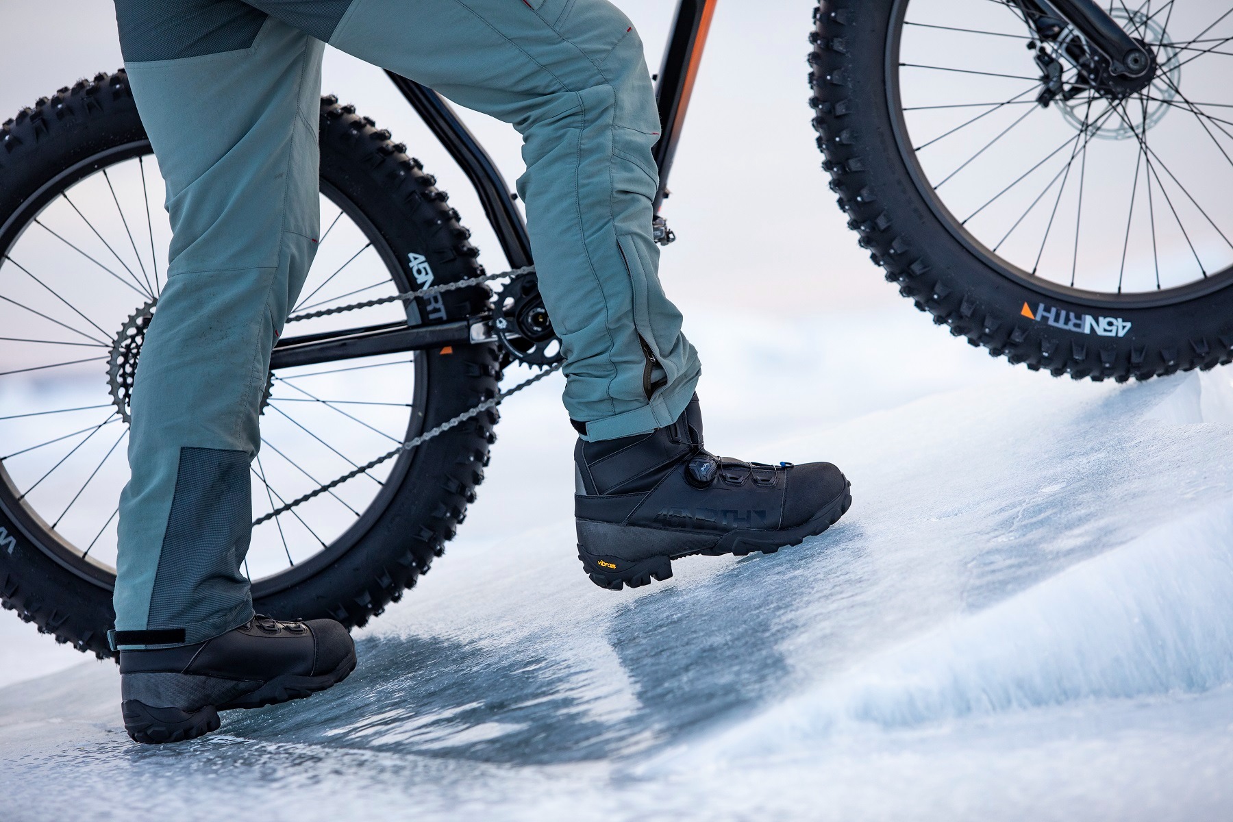 walking with bike on ice