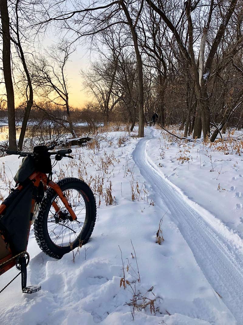 snowy trail with bike