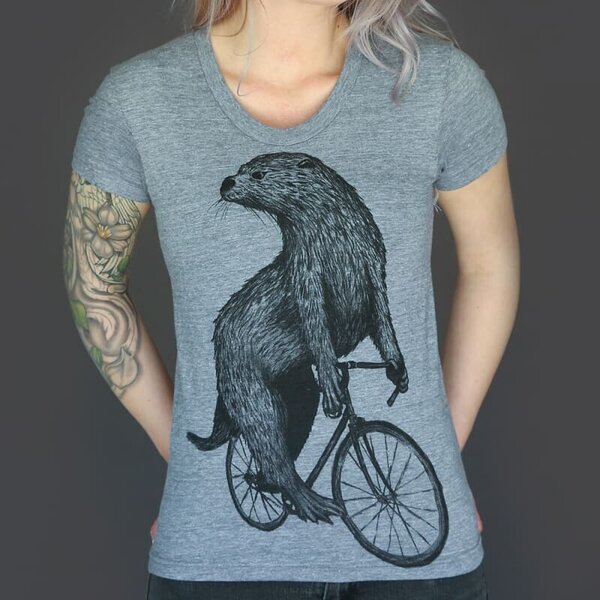 Mad Dogs & Englishmen Otter on a Bike Woman's Fit Shirt 