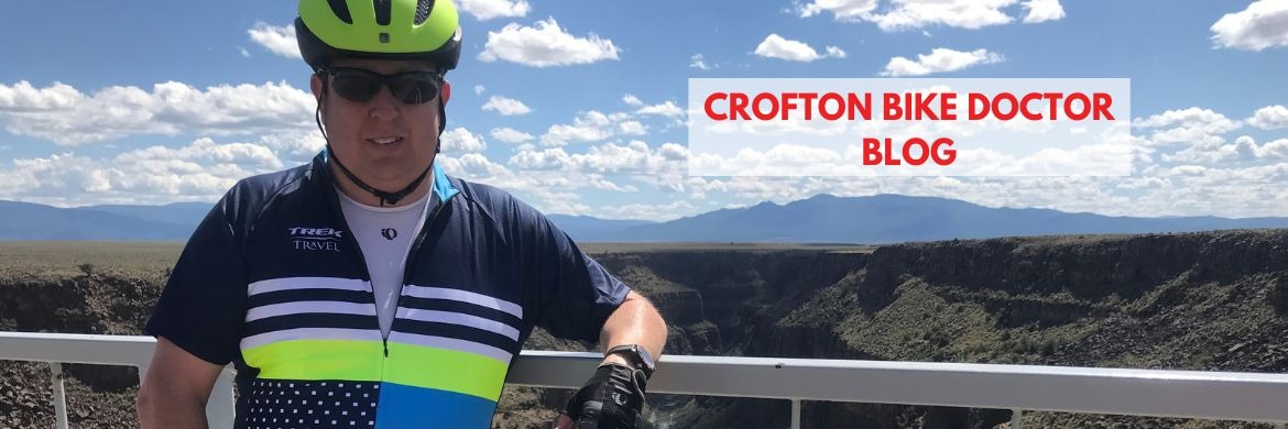 Crofton Bike Doctor Blog - Cyclist on a bridge