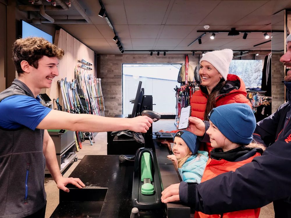 Family picking up season rental ski gear at CB Sportif in Westport, CT