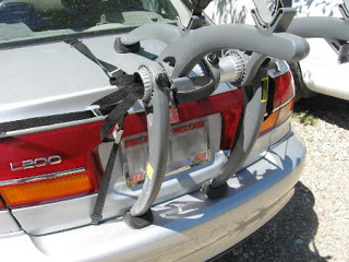 Car rack correctly positioned on rear bumper of vehicle