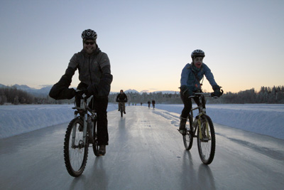 Bicyclists on icy trail