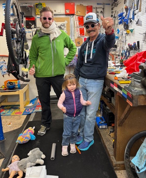 staff and child in the service department